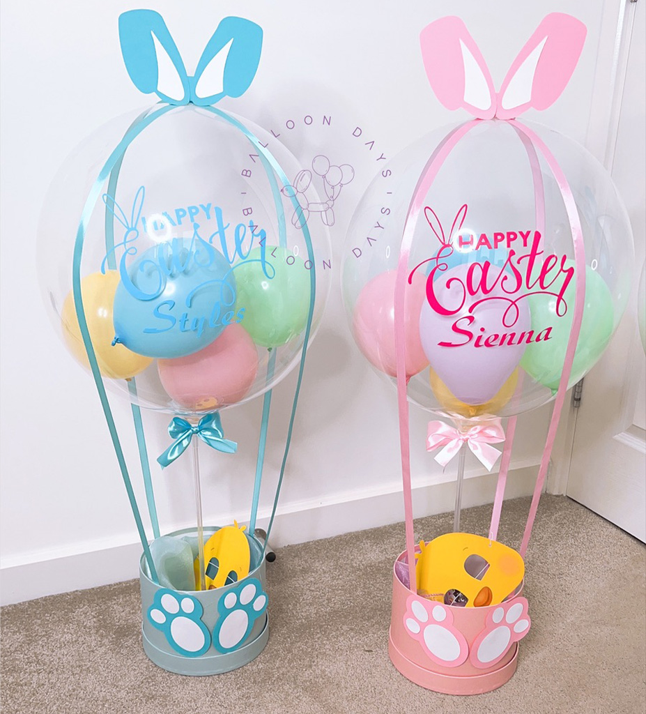 Pastel Easter balloon baskets with bunny ears in mint green and pink