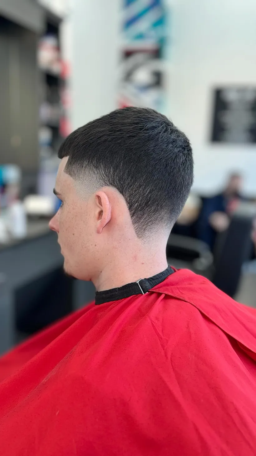 Skin fade with a sharp line-up