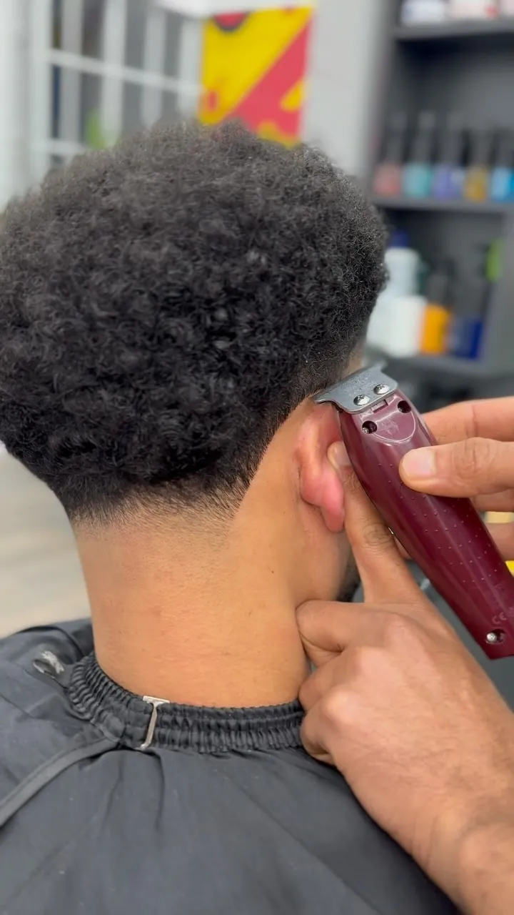 Clipper work cleaning up the neckline