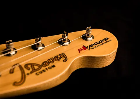 The hand painted Telecaster maple headstock with the J. Davey Custom decal and a Vancouver hand wound pickups decal