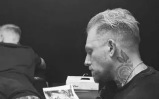 Phil Beaman working on a tattoo
