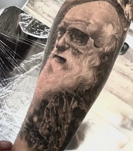 Bearded portrait blended with a skull in black and grey