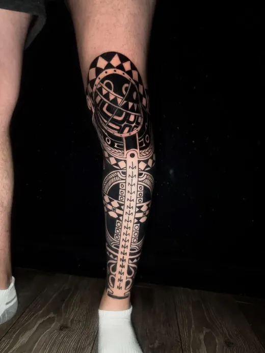 Geometric linework running the length of the leg
