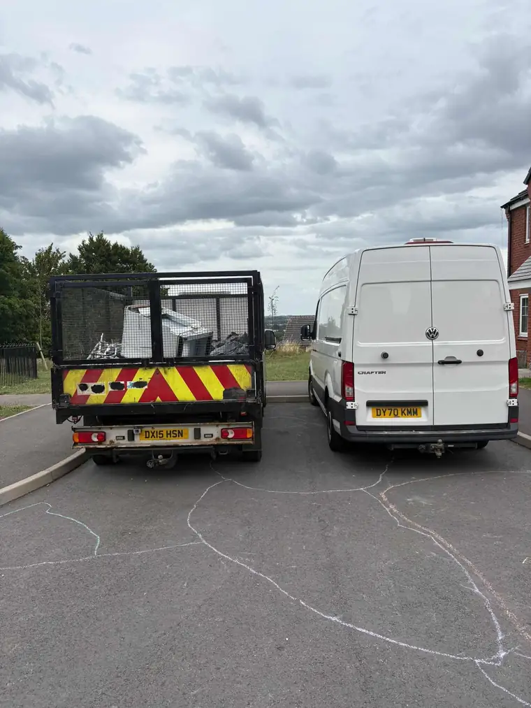 The Litter Me Removals caged tipper truck and van parked ready for a job