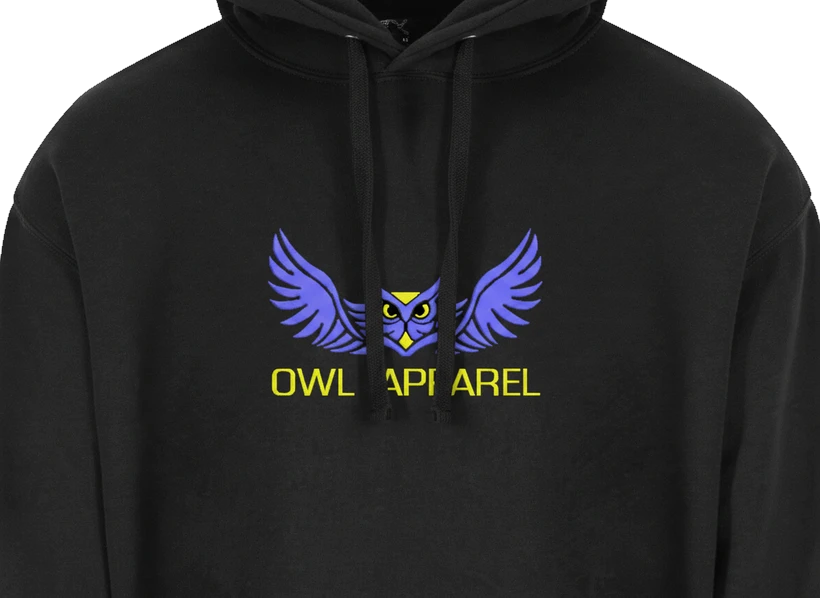 Black hoodie with the Owl Apparel owl logo embroidered across the chest, sitting behind the hanging drawstrings