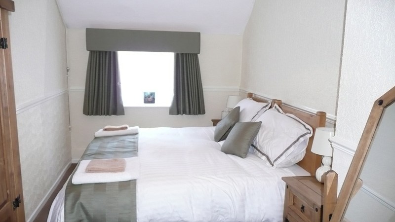 A quiet en-suite guest room above the inn