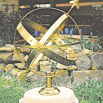 The all-brass Apollo armillary sphere, its four plain rings carrying fitted Roman numerals.