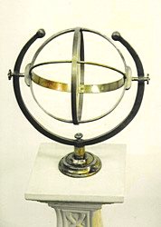 A Capricornus armillary standing on display in the showroom.