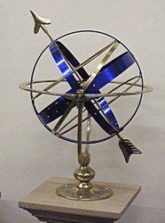 A Celeste armillary standing on display in the showroom.