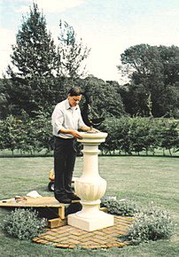 A Cygnus sundial being installed in its garden position.