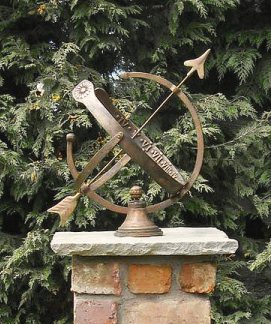 A Draco armillary sitting on a brick plinth made from reclaimed material.