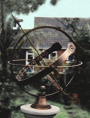 A Europa armillary set up in a garden.