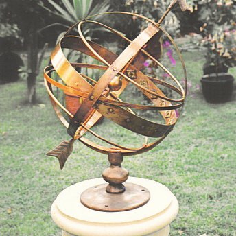 The all-bronze Orbis armillary sphere, its equatorial band carrying fitted Roman numerals.