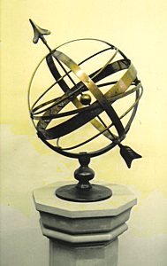 An Orbis armillary standing on display in the showroom.