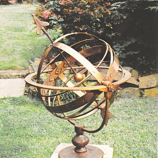 The all-bronze Taurus armillary, its pivoting globe held between two Taurean horns.