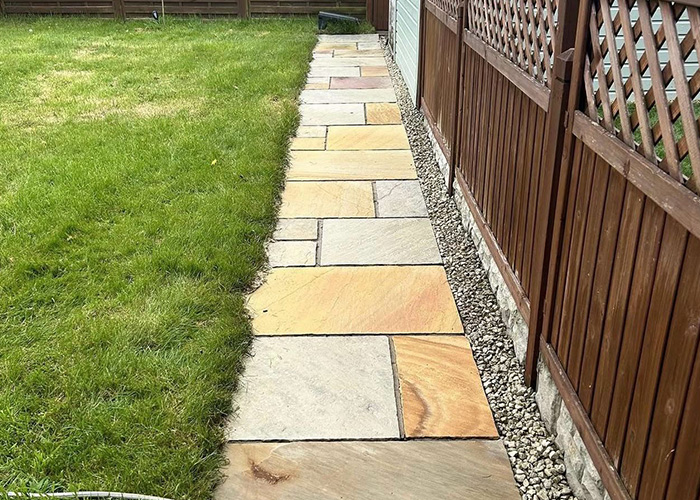 Clean sandstone patio path after pressure washing in Shrewsbury