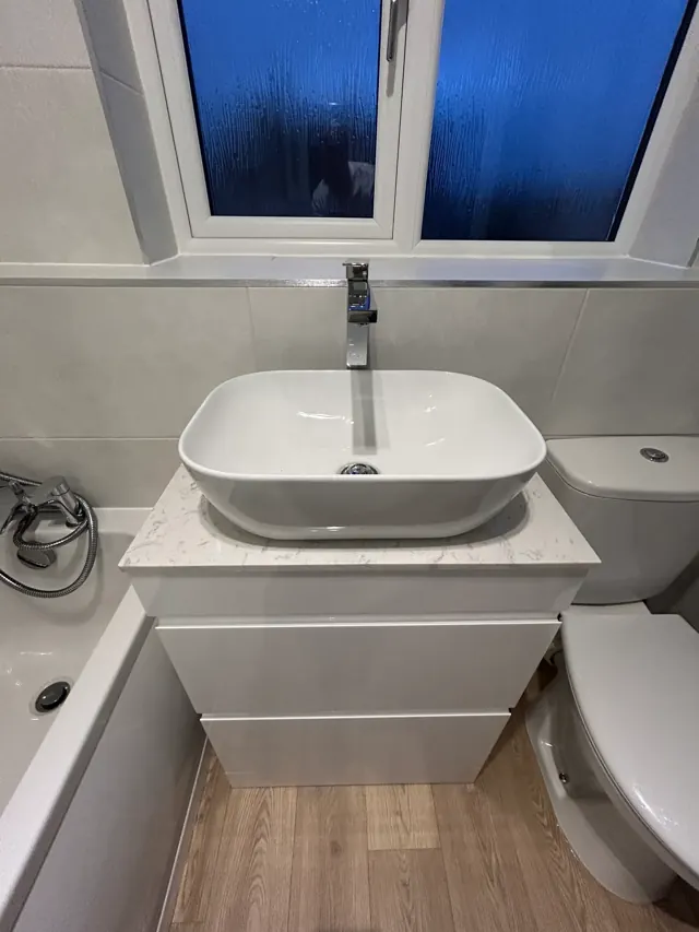 Bathroom with vessel basin by Telford Plumbers