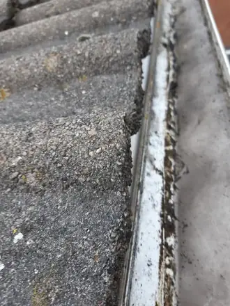 A packed ridge along the lip, photographed from the pole camera on a Telford gutter