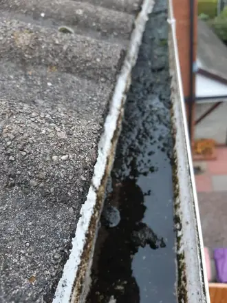 Standing water sat in the run, photographed from the pole camera on a Telford gutter