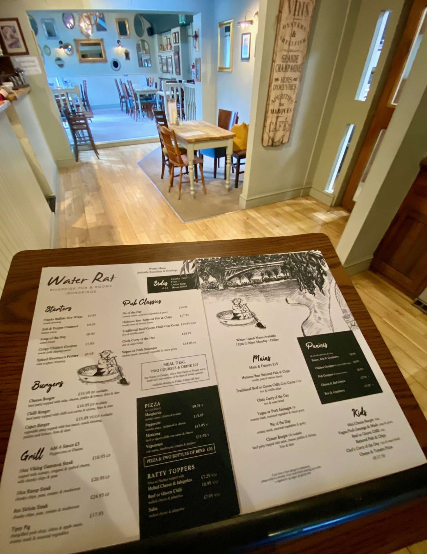 A bright dining space at The Water Rat set for an event
