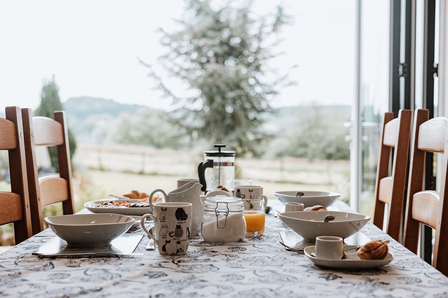A cooked breakfast laid out by the window with views over the Shropshire countryside